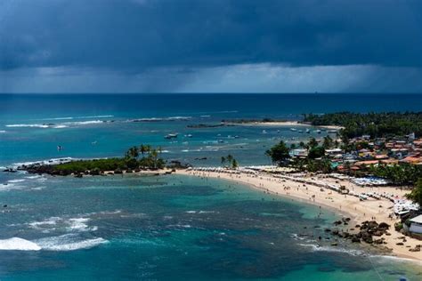 Premium Photo | View from the top of the beaches and houses of morro de ...