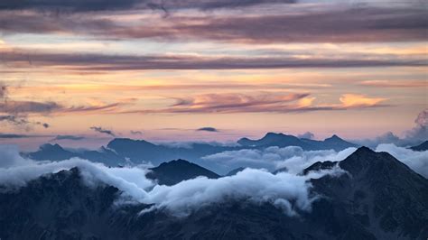 Clouds and mountains with a sunset photo – Free Aosta valley Image on Unsplash