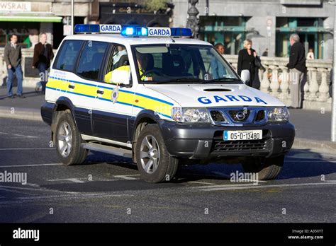 garda siochana irish police force cop officer in 4x4 police vehicle on ...