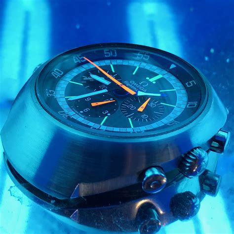 Omega Flightmaster under #UV light bonding crystal to case with uv glue during repairs at ...