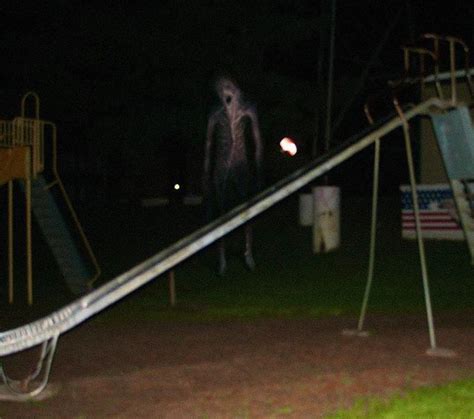 scary playground at night cursed image