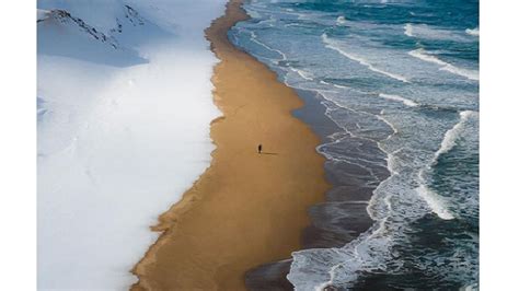 Mesmerizing! Sea meets sand and snow at Japan's Tottori beach