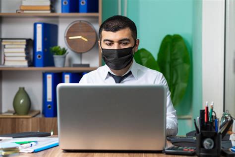 Young business man with black medical protective mask 1416193 Stock Photo at Vecteezy