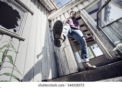 Young Man Kicks Smoke Outside Abandoned Stock Photo 144318373 ...