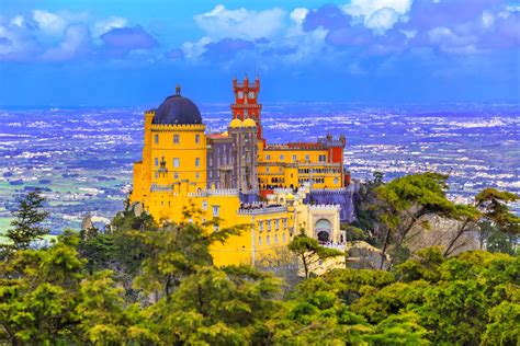 Get swept away by Portugal's Pena Palace with fairytale charm, stunning scenery, and top grub ...