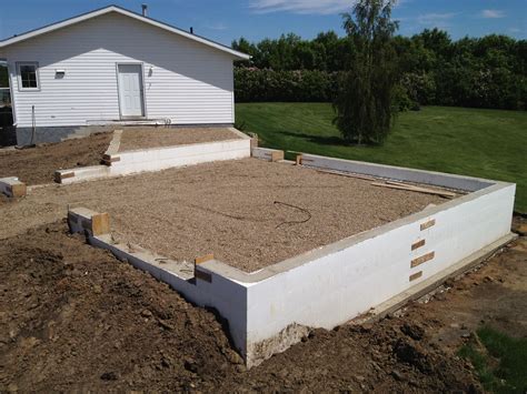 ICF frost walls on footings start the project. | Garage shop plans, Garage plans, Garage addition