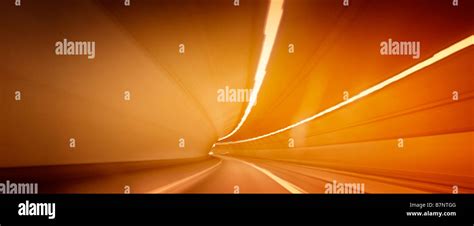 Car lights trails in a tunnel Stock Photo - Alamy