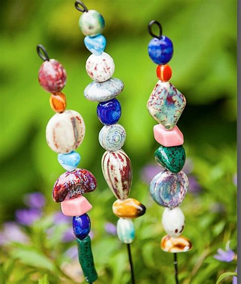 Garden decor idea with wire and glass beads | Colorful ceramics, Ceramic beads, Crafts to make