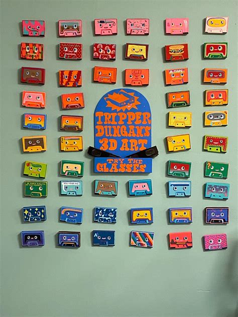 A variety of 3D cassette tapes painted by Tripper Dungan. Each cassette ...