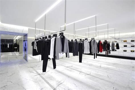 Yves Saint Laurent - Store Avenue montaigne | Clothing store design, Paris store, Retail fashion