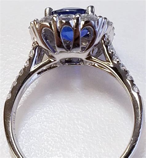 18 Karat White Gold Cushion Cut Sapphire and Diamond Ring For Sale at 1stdibs