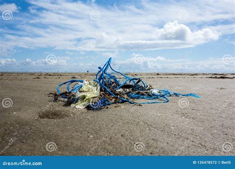 Plastic Marine Litter on the Beach Stock Photo - Image of environment, discarded: 135478572