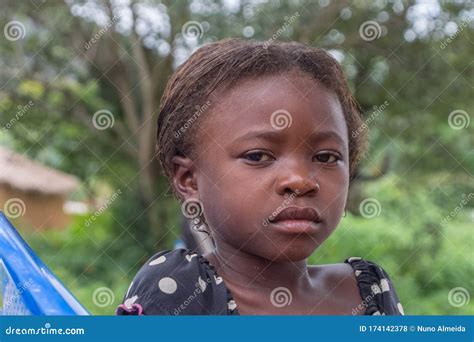 View of a Portrait of an African Girl, Child with Expressive Sad Look on Her Face Editorial ...