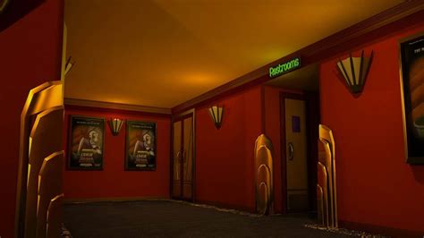 Download Hallway Of Cinema With Golden Interiors Movie Theater Background | Wallpapers.com