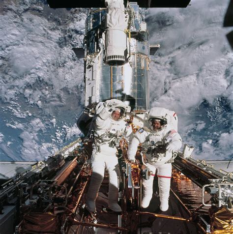 Astronauts John M. Grunsfeld and Richard M. Lineman EVA - a photo on ...