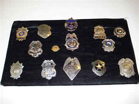 U.S. Police Cap Badges And Shields - auctions & price archive