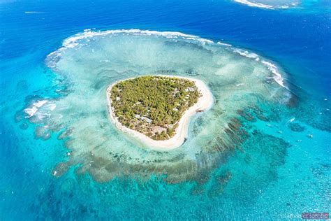 Matteo Colombo Travel Photography | Aerial view of Tavarua, heart shaped island, Mamanucas, Fiji ...