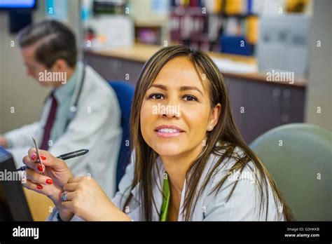 Hospital staff at reception desk in hospital Stock Photo - Alamy