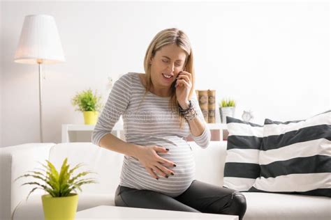 Pregnant Woman in Labor Calling Hospital Stock Image - Image of fast ...