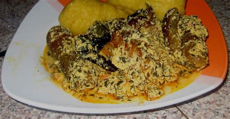 Eba and Egusi Soup with Fish and Pomo...Eba and Egusi Soup with Fish and Pomo | Nigerian Foods ...