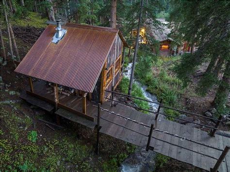 [FOR SALE] THIS MOUNTAIN CABIN HAS A CREEK THAT FLOWS UNDERNEATH IT ...