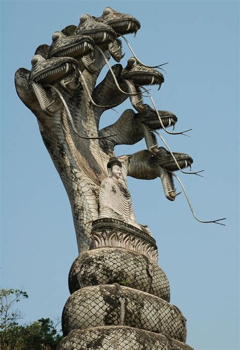 Buddha and the Seven-headed serpents statue in Sala Kaew Ku, Thailand ...