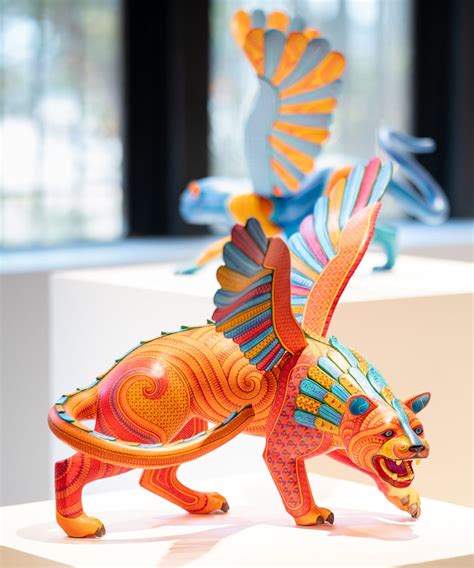 Vibrant Patterns Envelop Dozens of Mythical Animal Sculptures That ...