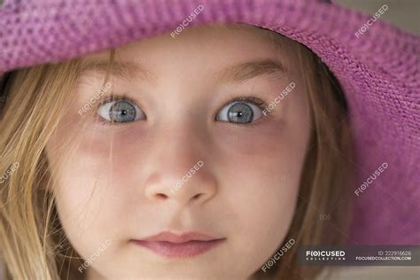 Close-up of little girl with blue eyes looking surprised — caucasian ...