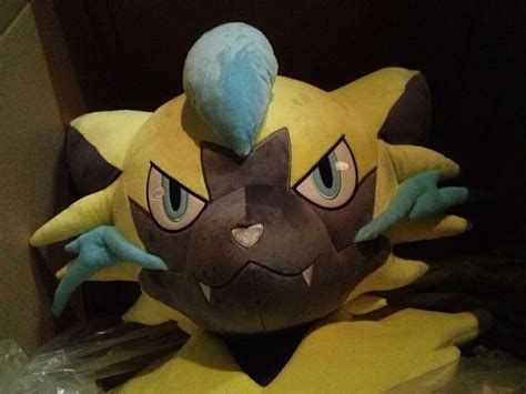 First Photos Of Pokemon Center’s Lifesize Zeraora Plush – NintendoSoup