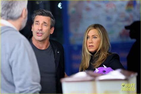 Jon Hamm Wins Jennifer Aniston A Purple Stuffed Toy At The Carnival For ...