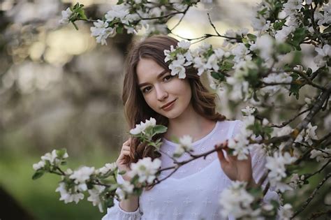 Premium Photo | Springtime fashion portrait of a young girl in a ...