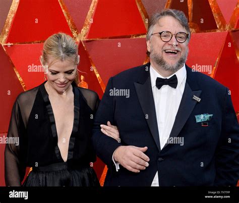 Screenwriter Kim Morgan and film director Guillermo del Toro arrive on the red carpet for the ...