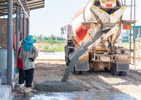 Concrete Mixer Truck Pouring Concrete on Floor in Construction Site ...