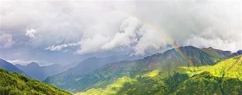 A Rainbow Shines Through Atmospheric Photograph by Kevin G. Smith - Fine Art America