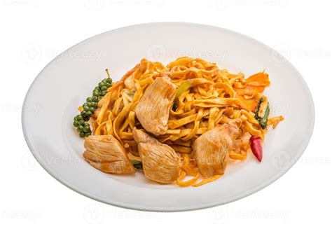 Fried noodles with chicken 11240664 Stock Photo at Vecteezy