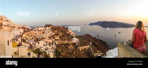 Santorini sunset in Oia, Greece Stock Photo - Alamy