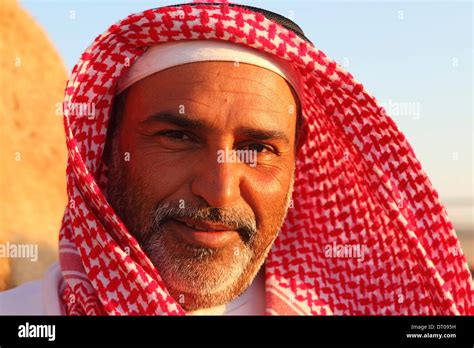 Portrait of a camel farmer in Abu Dhabi in the United Arab Emirates Stock Photo - Alamy