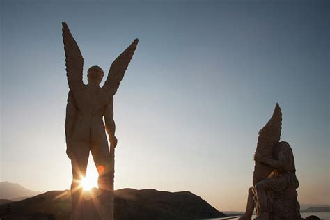 Agia Galini, Statue Of Icarus And Daedalus At Sunset, Crete, Greece ...