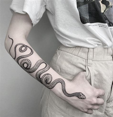 Snake Tattoo Meanings + 52 Designs that take your breath aw