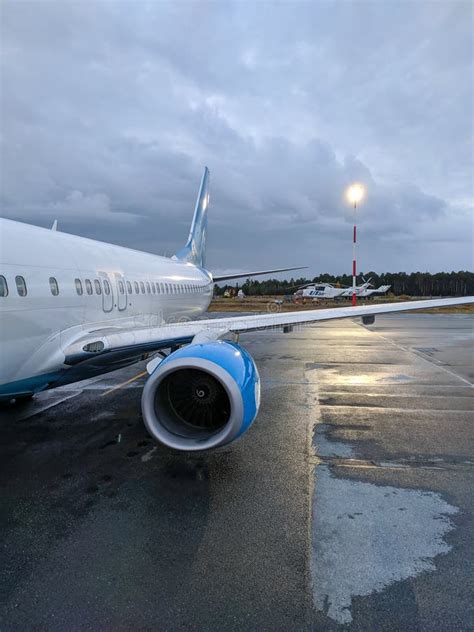 Surgut, Russia - September 20, 2021: View of the Aircraft Wing and Engine at the Airfield in ...