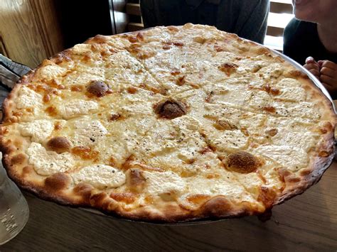 The Bianca from Rubirosa in NYC. Ricotta mozzarella garlic & oregano. The crust was incredibly ...