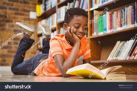 Cute Little Boy Reading Book Library Stock Photo 259321898 - Shutterstock