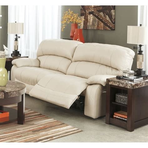 Ashley Damacio Leather 2 Seat Reclining Sofa in Cream - U9820181