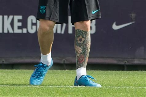 Lionel Messi shows leg tattoo at Argentina training session - Irish ...