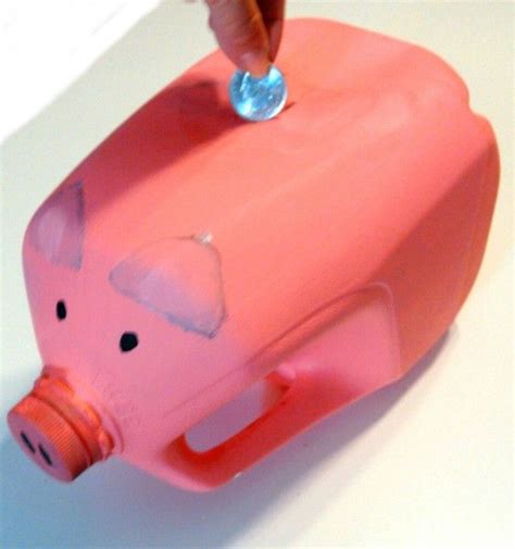 Making a Gallon Milk Jug Piggy Bank | Milk jug crafts, Recycling projects for kids, Diy recycled ...