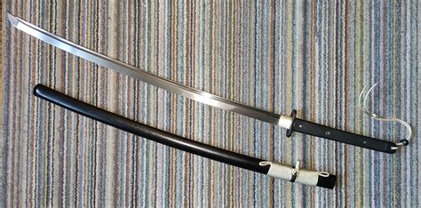 Grabbed a Hanwei Tactical Katana at a VERY reasonable price - that's nice! : r/SWORDS