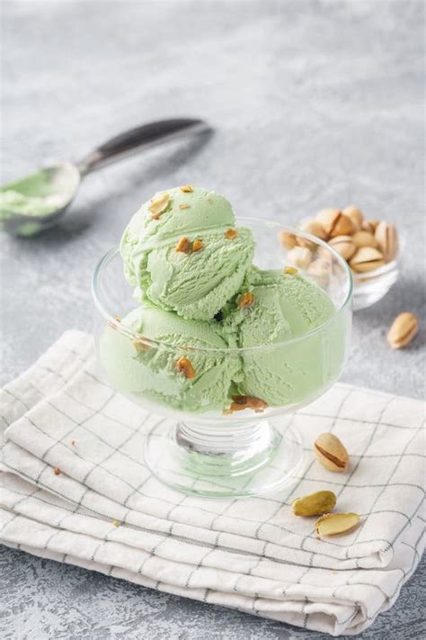 Pistachio Ice Cream with Chopped Nuts. Summer Dessert Stock Photo - Image of creamy, spoon ...