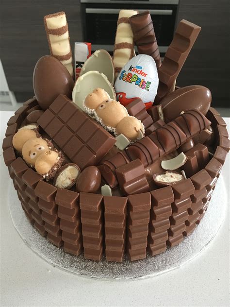 Kinder themed cake made with over 80+ bars of kinder chocolate !!! Even the icing is kinder ...