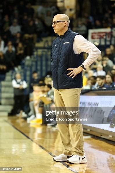 Akron Zips head coach John Groce watches the action on the court ...