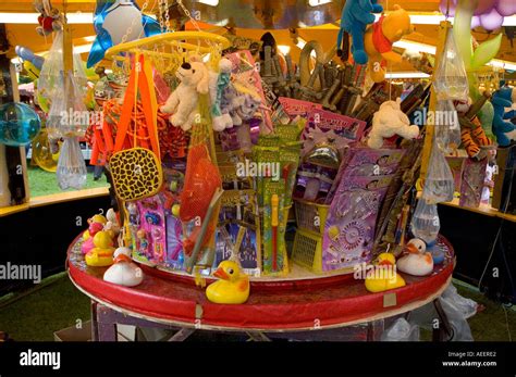 Hook a duck fairground stall with prizes including toys and goldfish Stock Photo - Alamy